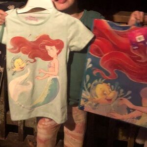 2 Little mermaid 🧜🏽‍♀️ Tees a shopping bag and 2 shirts size 7 and size 8 !